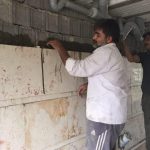 سنگ کردن دیوار ساختمان
